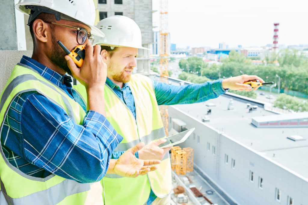 Two Construction Workers on Building site